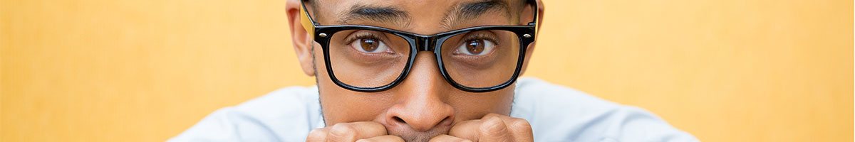 Nervous man with glasses. Remove the anxiety with Mystery Shopping from Shoppers Confidential