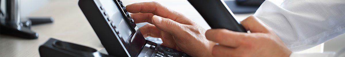 Man using a phone to hire a Mystery Shopper